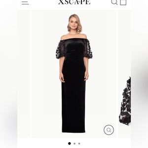 Xscape black velvet formal dress with puffy sleeves. Size 16W.